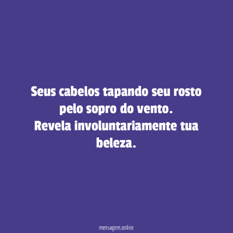 Seus cabelos tapando seu rosto pelo sopro do vento